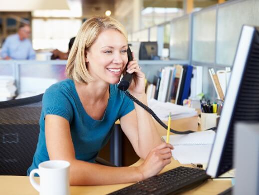 Woman On Phone In Office (1)