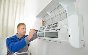 Repairer Repairing Air Conditioner